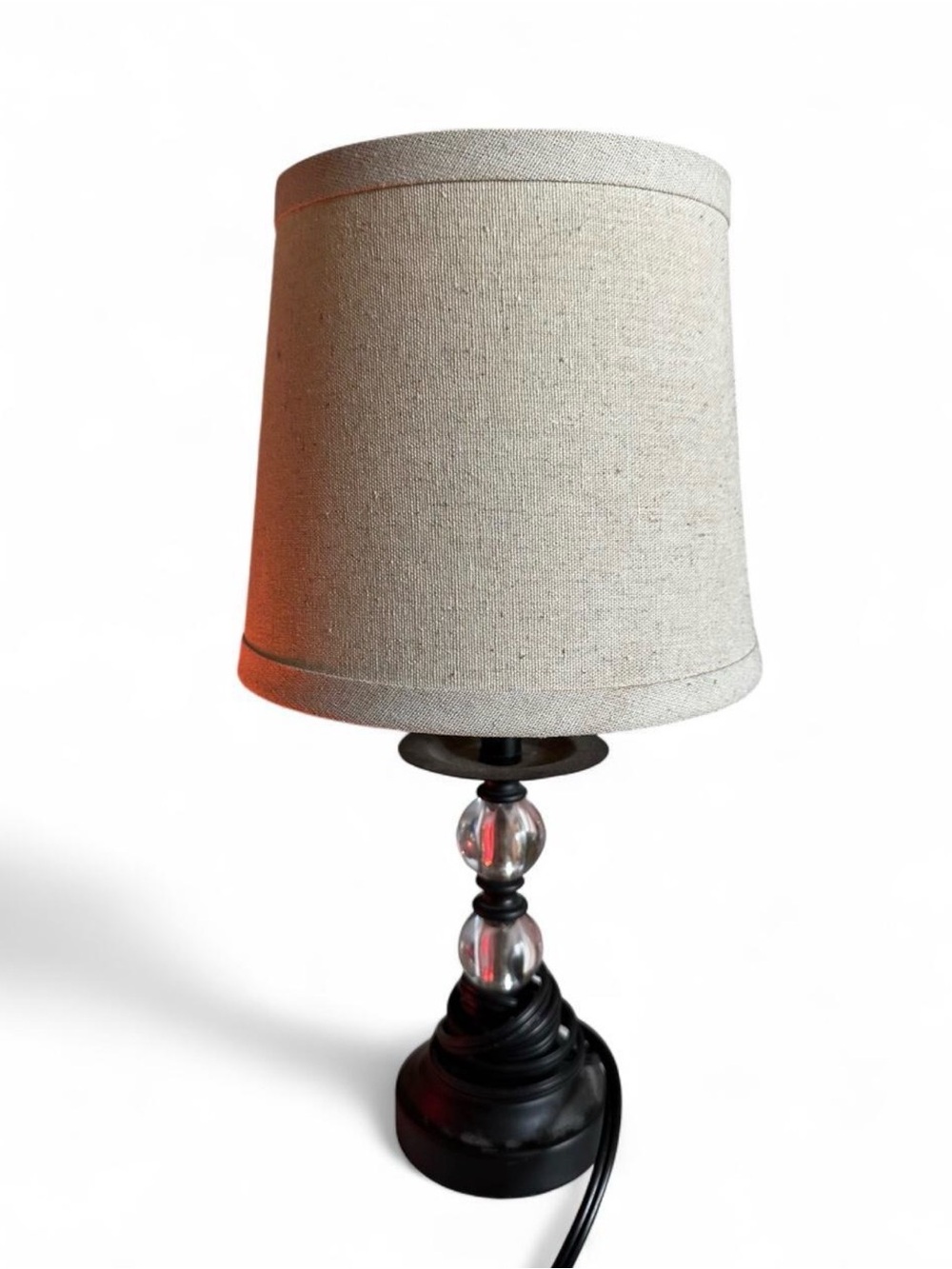 Neutral Linen Table Lamp with Clear Glass Accent and Black Base